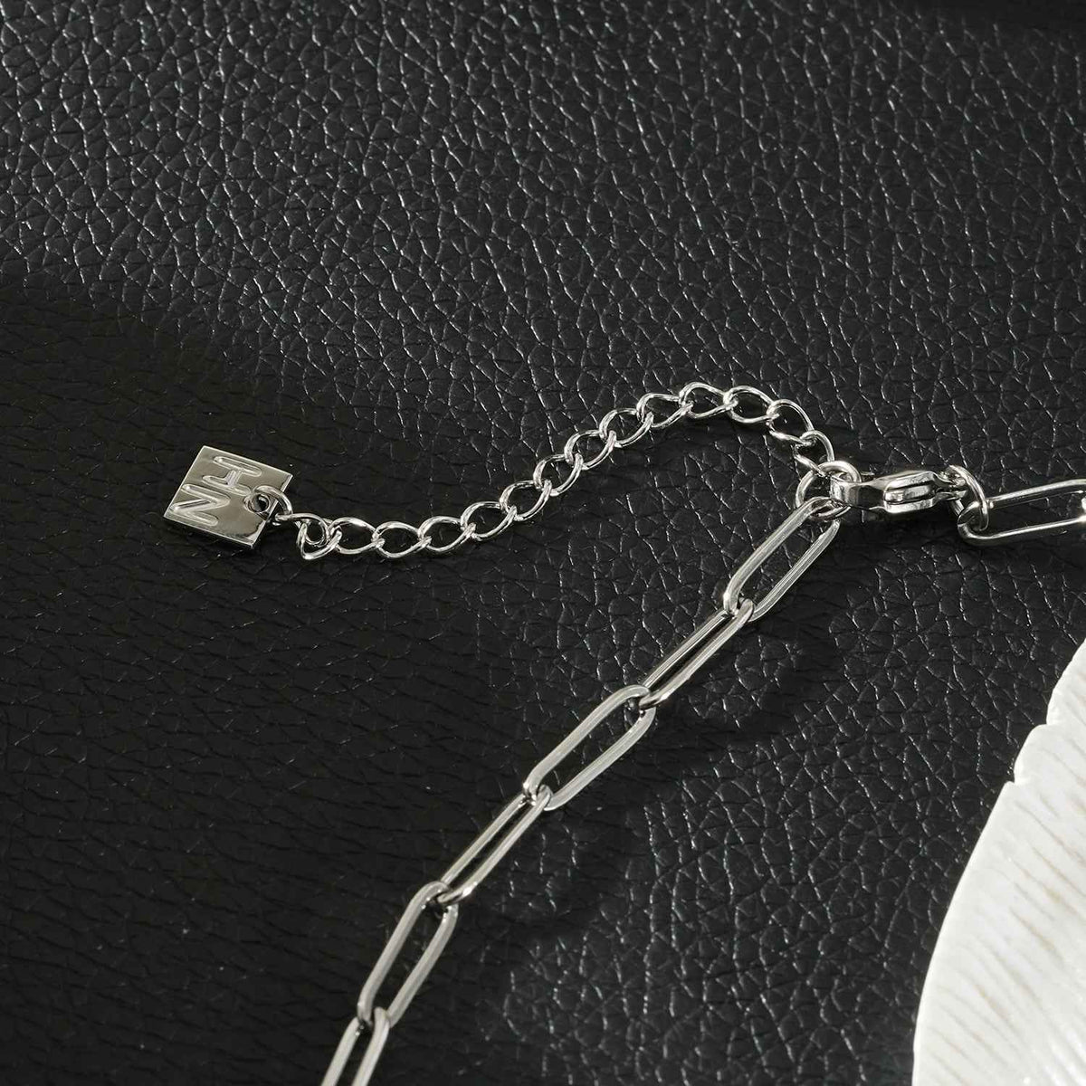 HEART WHITE Silver (White Gold): Paper Clip Chain Anchoring an Enameled White Heart Charm