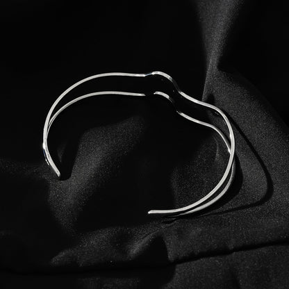 CHITRA: Industrial-Chic Bracelet with Abstract Shaped Parallel Bands in Silver Toned White Gold