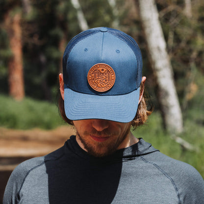 Winding Wilderness Leather Patch Trucker Hat