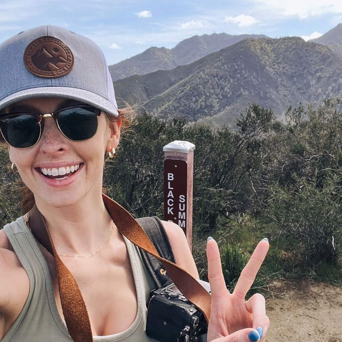Mountain Escape Leather Patch Trucker Hat