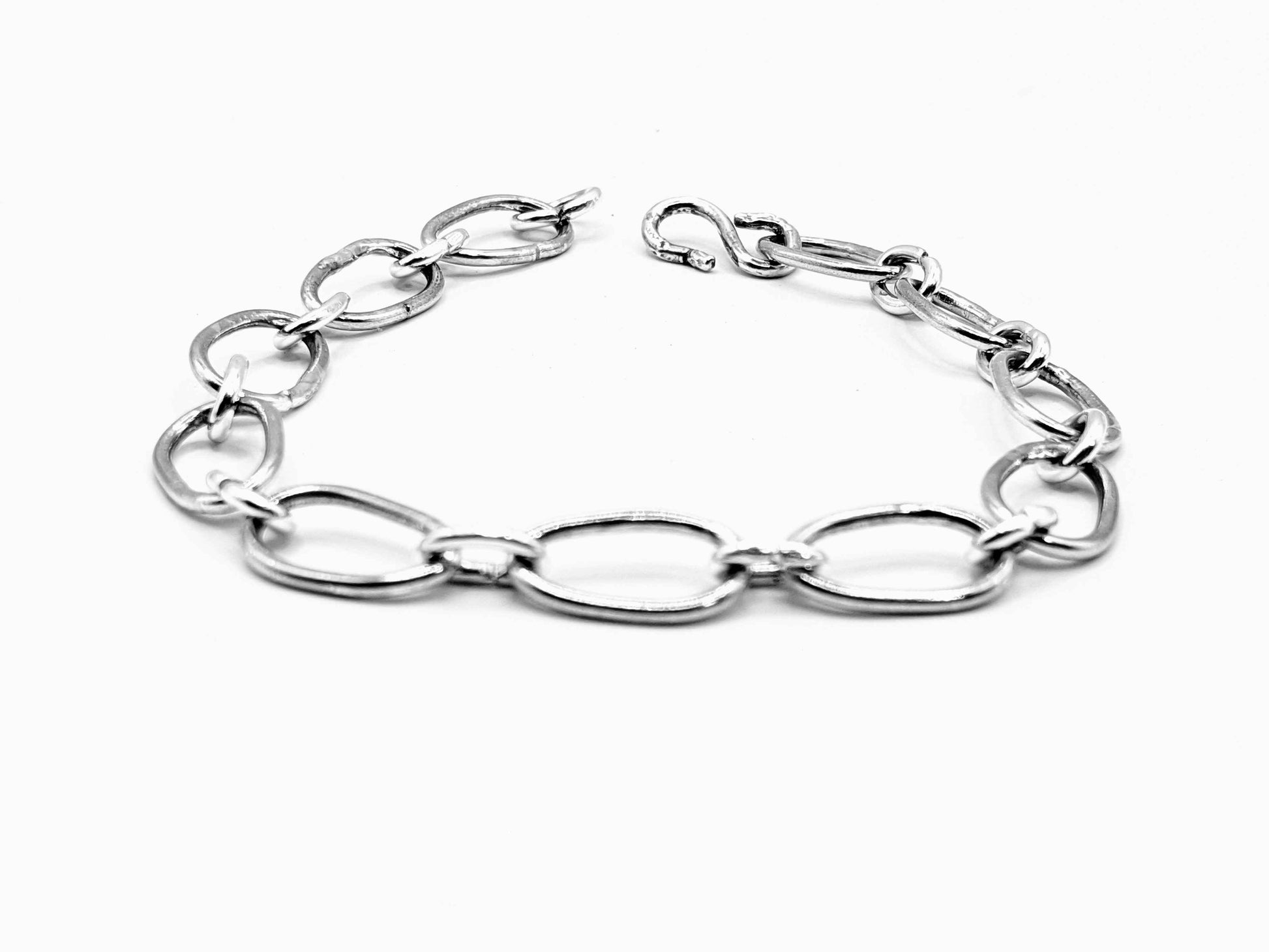 Radiant Linkage: Handcrafted Sterling Silver Oval Chain Bracelet
