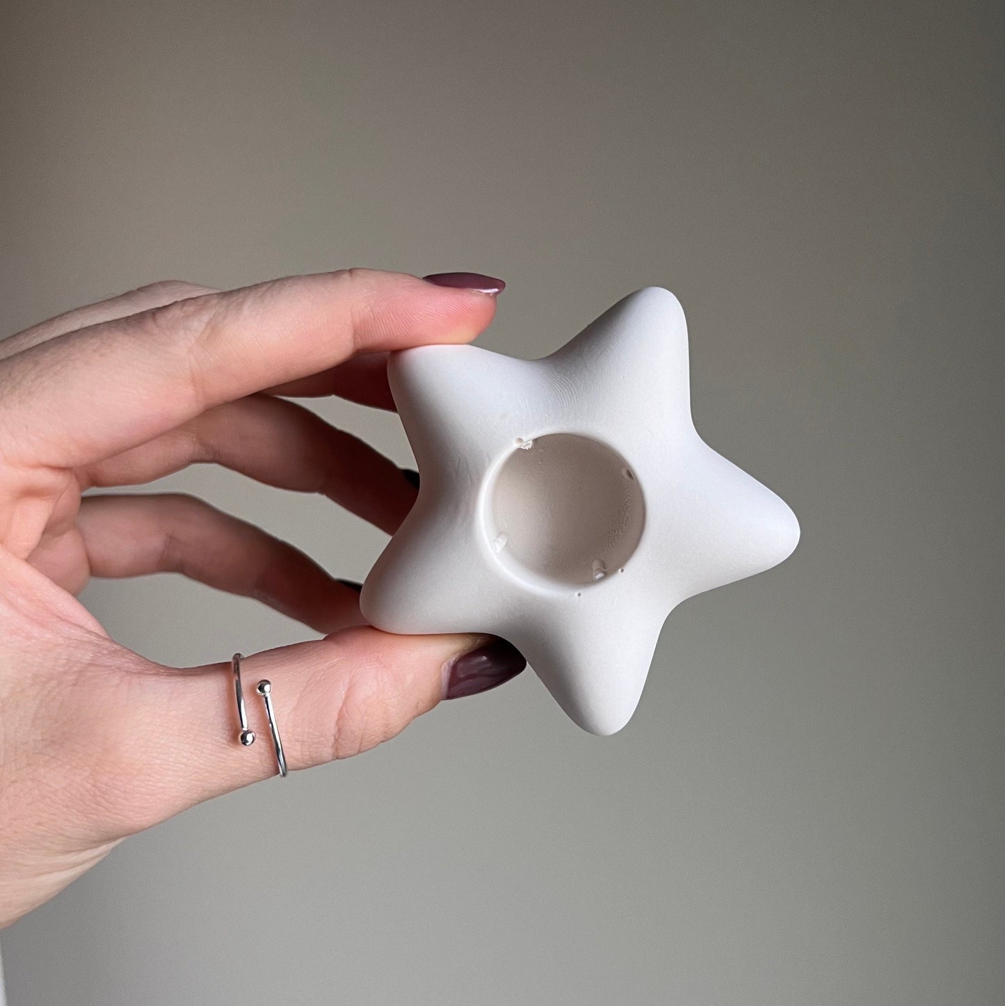 Kerzenständer aus Jesmonit in Sternform: Minimalistische Tischdeko
