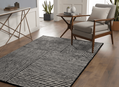 Monochrome Teppich mit geradlinigem Blockmuster